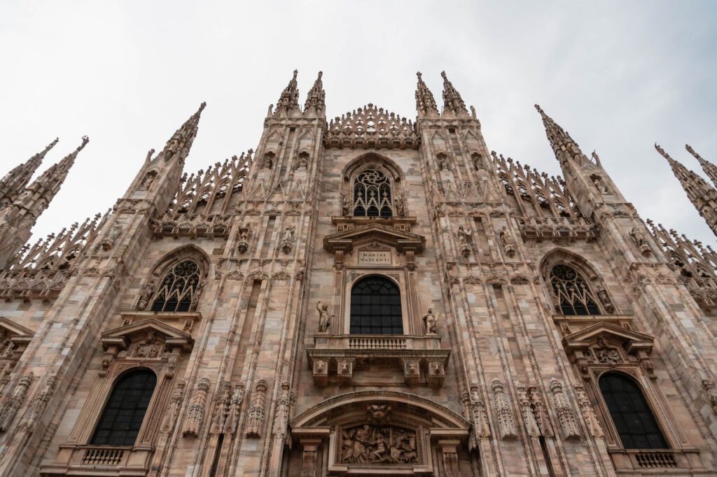 Gothic facade of the Duomo di Milano, the first stop in a Milan itinerary